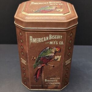 Vintage American Biscuit Tin,Brown With Parrot Design .